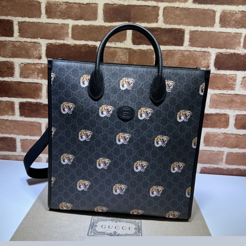 G*u*i shopping bags